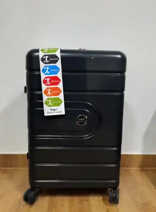 AI Video: Pull handle from up rotate and drag trolley