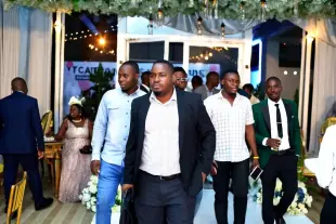 AI Video: Animate each person in the picture, show those people entering the event hall...