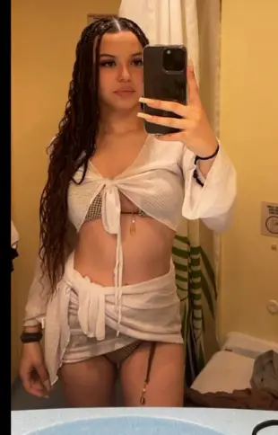 AI Video: shes aroused and she turns around and you can see her sexy ass and she bends...