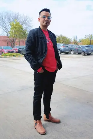 AI Video: A realistic cinematic animation of a man standing confidently outdoors,...