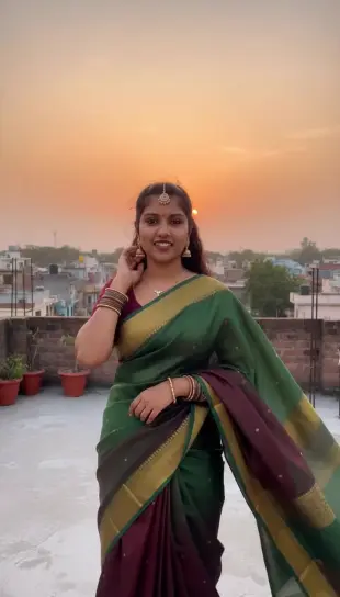 AI Video: A beautiful young girl standing on a rooftop during golden hour, soft warm...