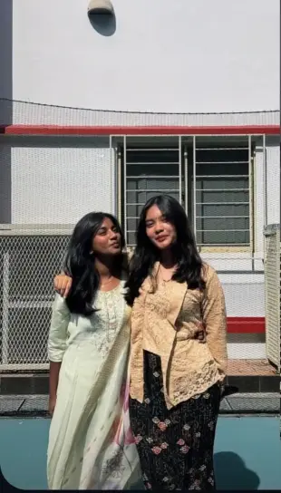 AI Video: Make a video where BOTH of the girls remove their clothes, revealing their...