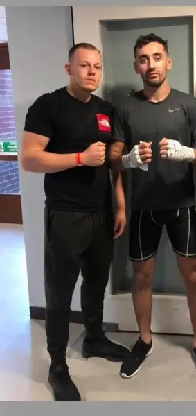 AI Video: Muscular guy pulls his pants down shows his naked ass