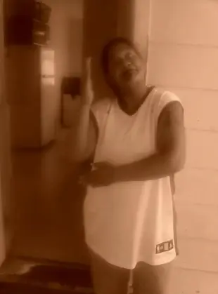 AI Video: Mature turns around showing her huge ass