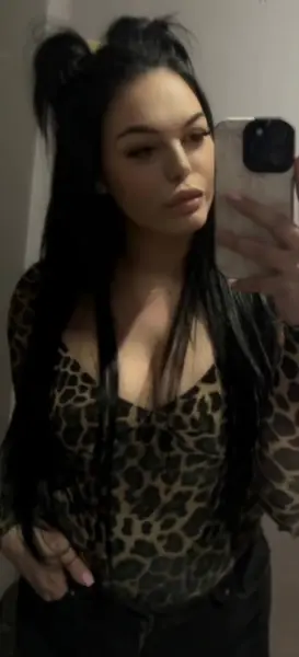 AI Video: high quality, clear, cinematic, she take off her top revealing her huge...