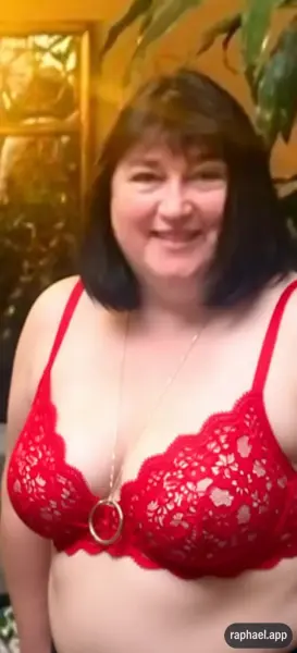 AI Video: Her naked sitting on a couch legs open