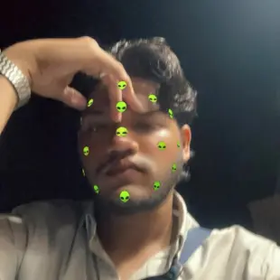 AI Video: Consider a circumstance of this photo holding a selfie video on a white wall...