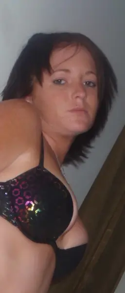 AI Video: make her act excited to see me, expand her boobs and make them look bigger