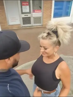 AI Video: Woman puts her hand down inside man's pants the has a shocked look on her...