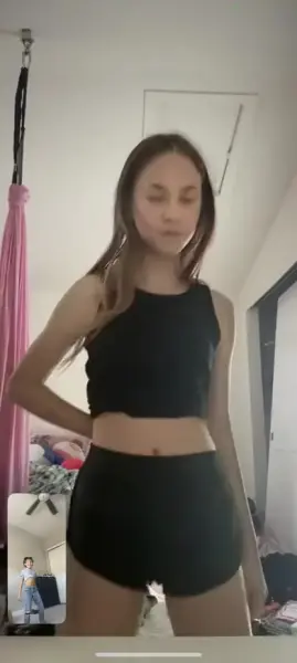 AI Video: Make her take off her clothes and a boy kisses her