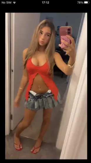 AI Video: She lifts up her skirt and rubs her pussy