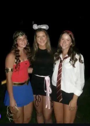 AI Video: Make the girl on the right, take off her shirt and bra to show her boobs, and...