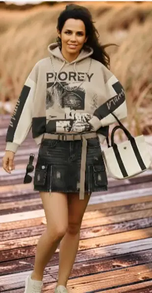 AI Video: she sits and crosses her legs