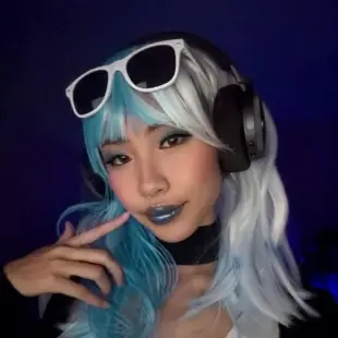 AI Video: A large, veiny black penis appears from the bottom of the frame and the girl...