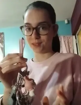 AI Video: person opens his mouth stick out showing his tongue licks the stick in front...