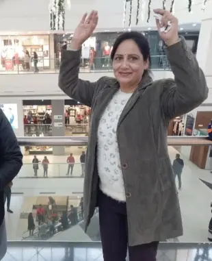 AI Video: “Animate the person in the provided image so that they slowly raise both...