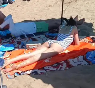 AI Video: a person who is lying down gets up and stands on his knees but his head is...