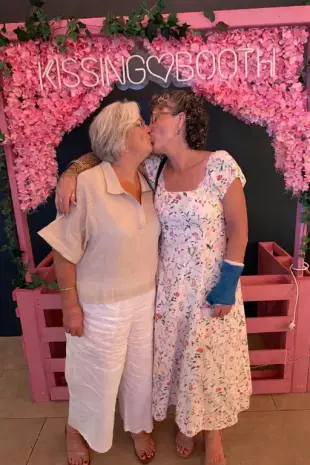 AI Video: Have the girls naked and rubbing the others breasts