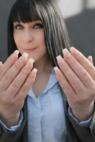 AI Video: Make her fingers wiggling teasing me.