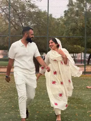 AI Video: Make a slow mo cinematic romantic walking video . Make it realistic and...