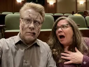 AI Video: make him bloodier and have him slowly turn his head and open his mouth like...