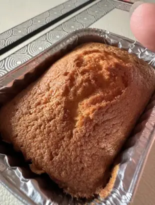 AI Video: Generate a eye dropping video of a traditional butter cake