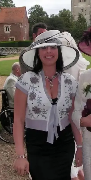 AI Video: The lady undresses revealing her breasts and big areola nipples she is laughing