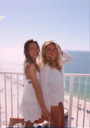 AI Video: Make the girl on the right bend over and the girl on the left grab her by the...