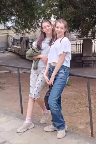 AI Video: Persons drop down on the ground their legging and pant showing their thongs...