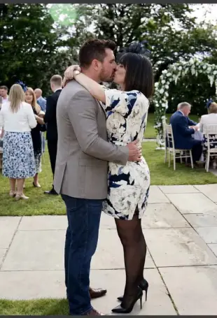 AI Video: Man and woman passionately French kiss…her head lightly to her right.  Their...