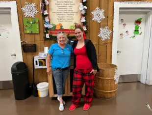 AI Video: Both women laying on their backs on the bed as two new with huge massive...