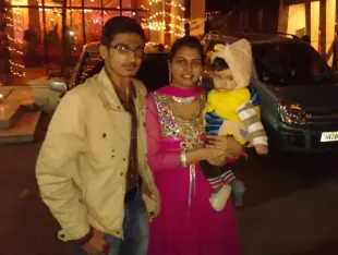 AI Video: All three people should be happy and dancing around with the kid