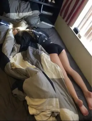 AI Video: This woman, naked from the waist down with her sweater still on, masturbating...