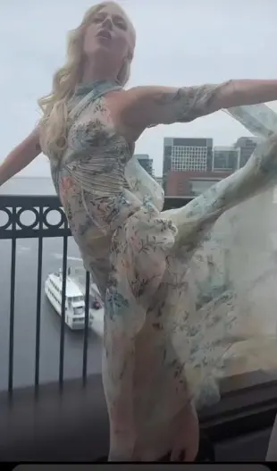 AI Video: Stops poses walks turns poses