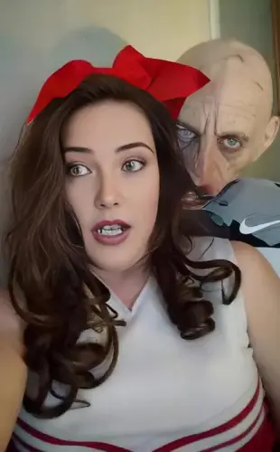 AI Video: Animate this scene with the cheerleader scared and in disbelief as she and...