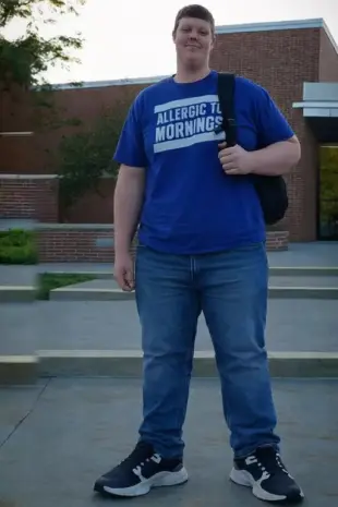 AI Video: This man is 6 feet 4 inches tall, weighs 270 pounds, and wears size 17 shoes....