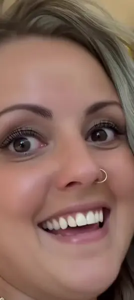 AI Video: She shows her right fist and starts to move up and down for 5 times while...