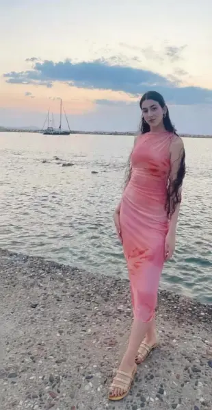 AI Video: Make the woman show us her feet.