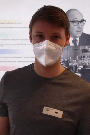 AI Video: The boy is heavily breathing in the mask.