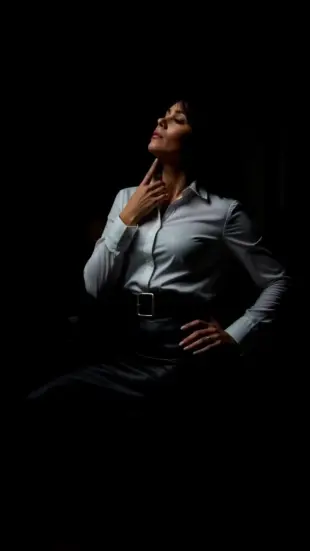 AI Video: She looks up sharply, eyes focusing intently. Her body tenses, then...