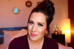 AI Video: Medium close-up shot of a woman facing directly into the camera, eye level,...