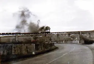 AI Video: Let the train with coal move on while black clouds come out of the pipe