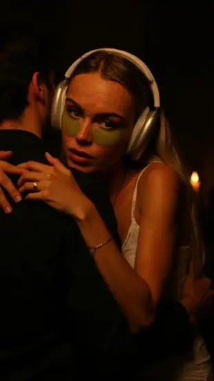 AI Video: She collapses forward, body trembling violently, chest heaving with ragged...