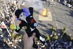 AI Video: The doll falls down.