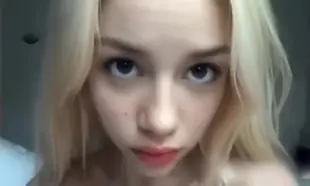 AI Video: She lying on her back on bed.