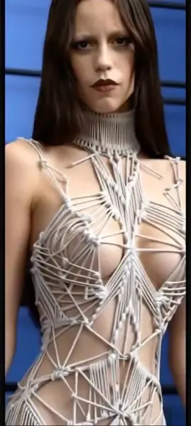 AI Video: Jenna ortega is enjoying the modeling and smile as she shakes her body