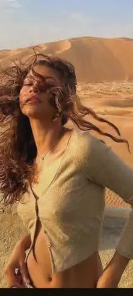 AI Video: Zendaya in the searing desert modeling