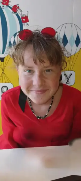 AI Video: She gets splashed with water and she is soaked with her shirt also wet