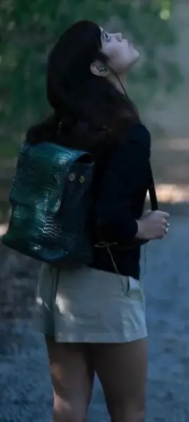 AI Video: Jenna ortega is walking home from college and looks up at the sky hearing a...