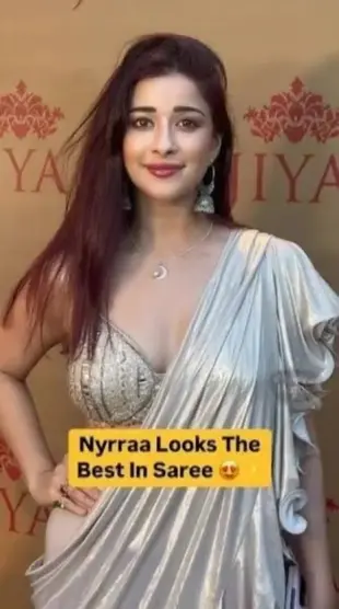 AI Video: Show her in black gown.